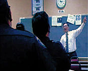 Reyna in front of classroom