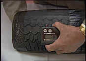 Mini-Buster being used to scan a tire